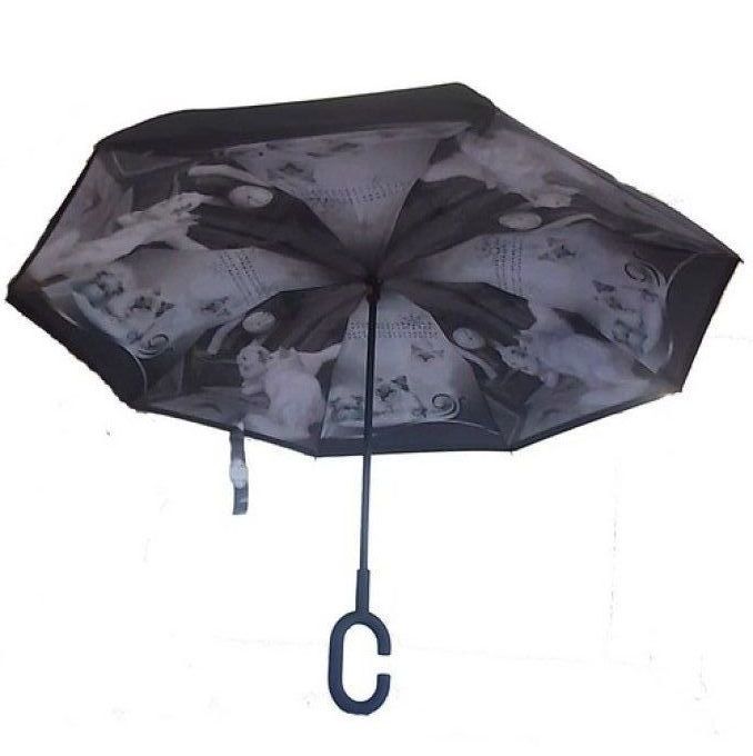 Parapluie inversé décoré d'imprimés photos de chats.