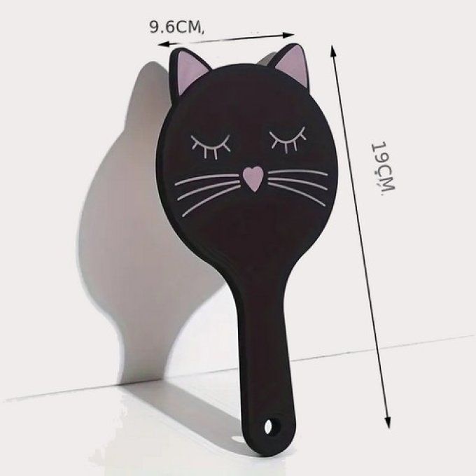 Brosse noire tête de chat.