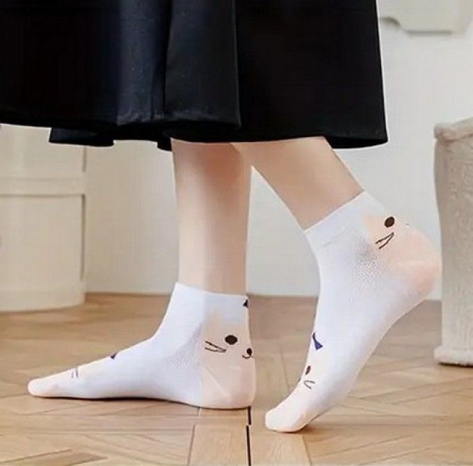 Paire de chaussettes chat à la mèche.